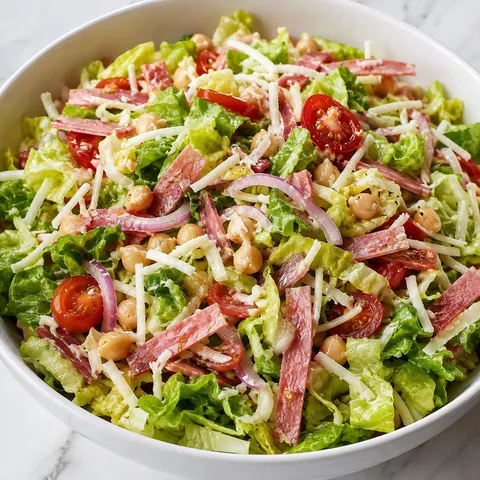 Chickpea salami chopped salad with mozzarella and red wine vinaigrette