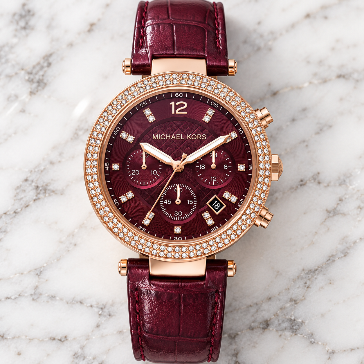 Michael Kors MK6986 red dial watch with rose gold-tone case and leather strap
