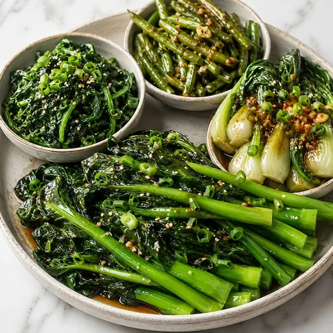 Asian green vegetable sides with gai lan, spinach, green beans, and bok choy
