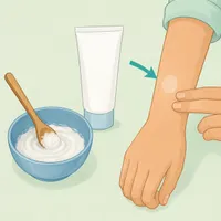 Illustration of a small bowl of baking soda cream with a patch test on skin.